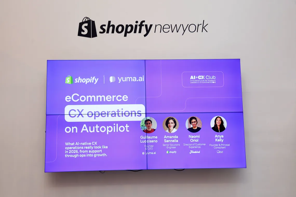 Shopify x Yuma AI eCommerce CX Operations on Autopilot title screen on the video wall at Shopify New York