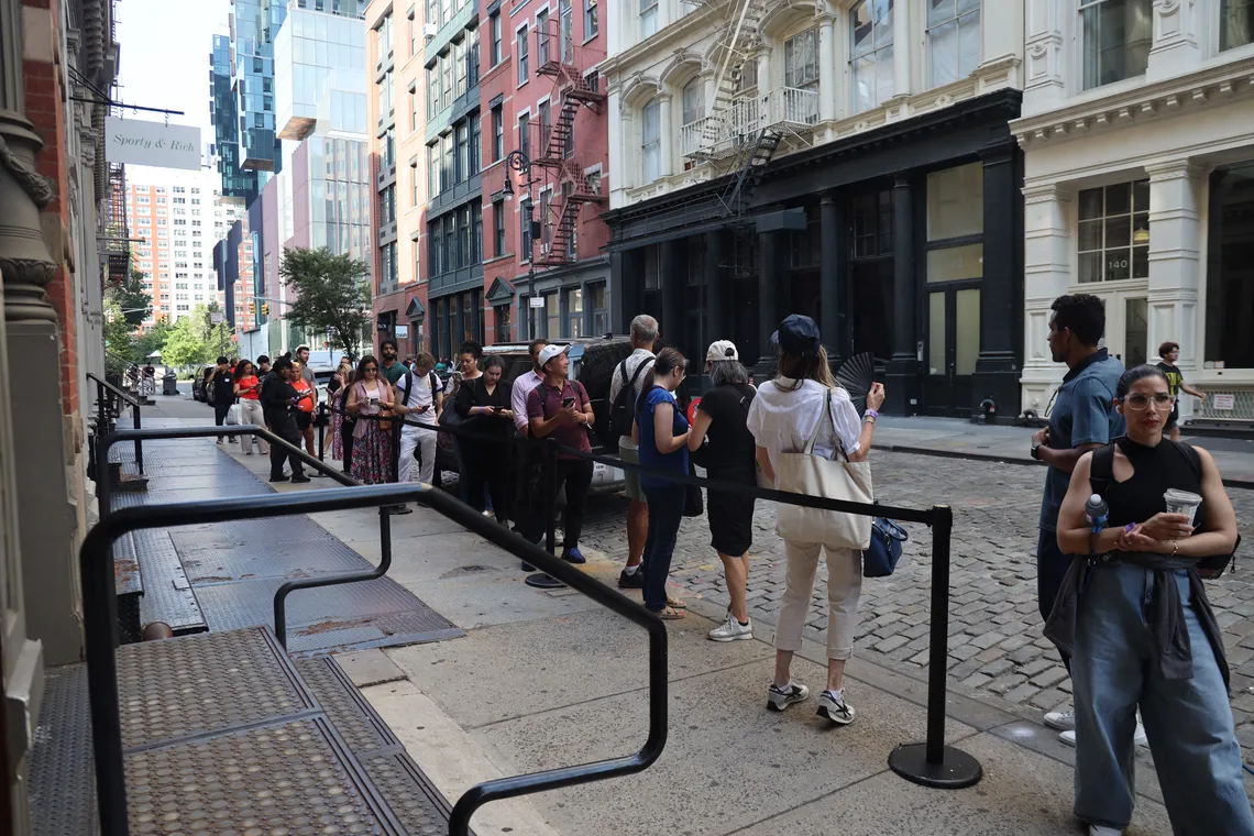 Attendees lined up along the SoHo street outside Shopify New York before the event