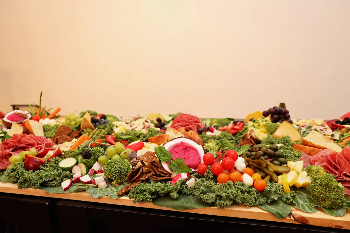 Grazing table of food and drinks set up for the Commerce on Autopilot reception